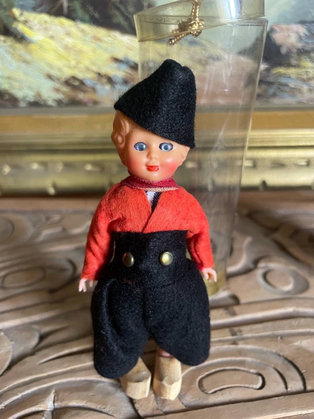 Vintage celluloid 1950s Doll with Red Jacket and Black Hat and wooden clogs